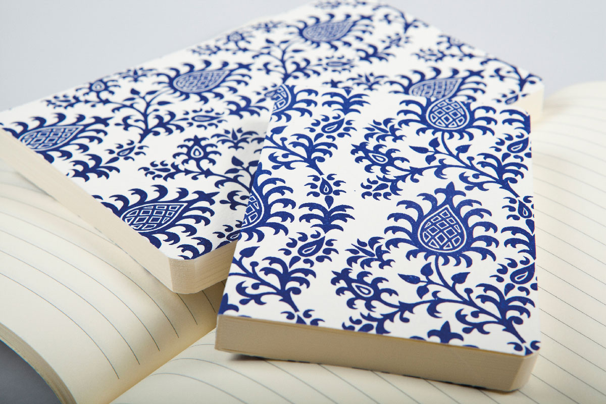 notebooks covered with decorated paper